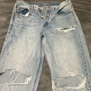 Women’s size 10 90s boyfriend distressed jean in good used condition.